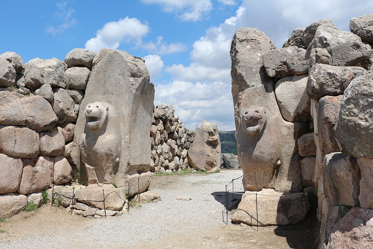 The Lion Gate at Hattusa, with carved lions against a blue sky